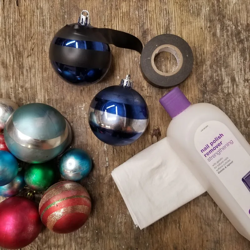 Fingernail polish remover used in conjunction with electrical tape and paste wax creates a great 