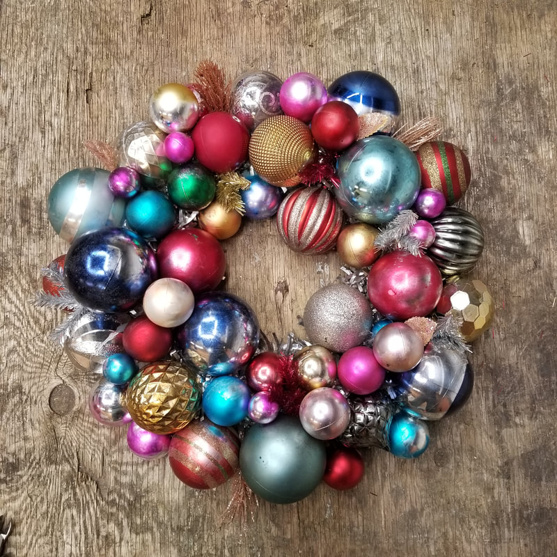 Vintage look wreath created using altered inexpensive plastic ornaments by Aaron Christensen.