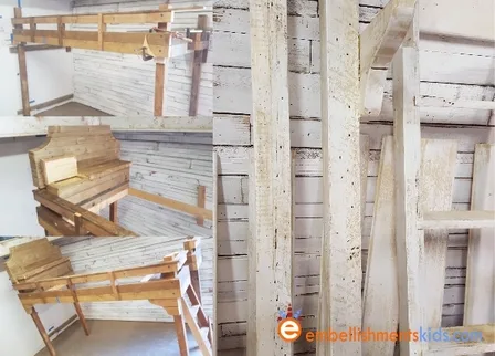 Reclaimed wood is fashioned into a rustic loft bed for a girls bedroom.